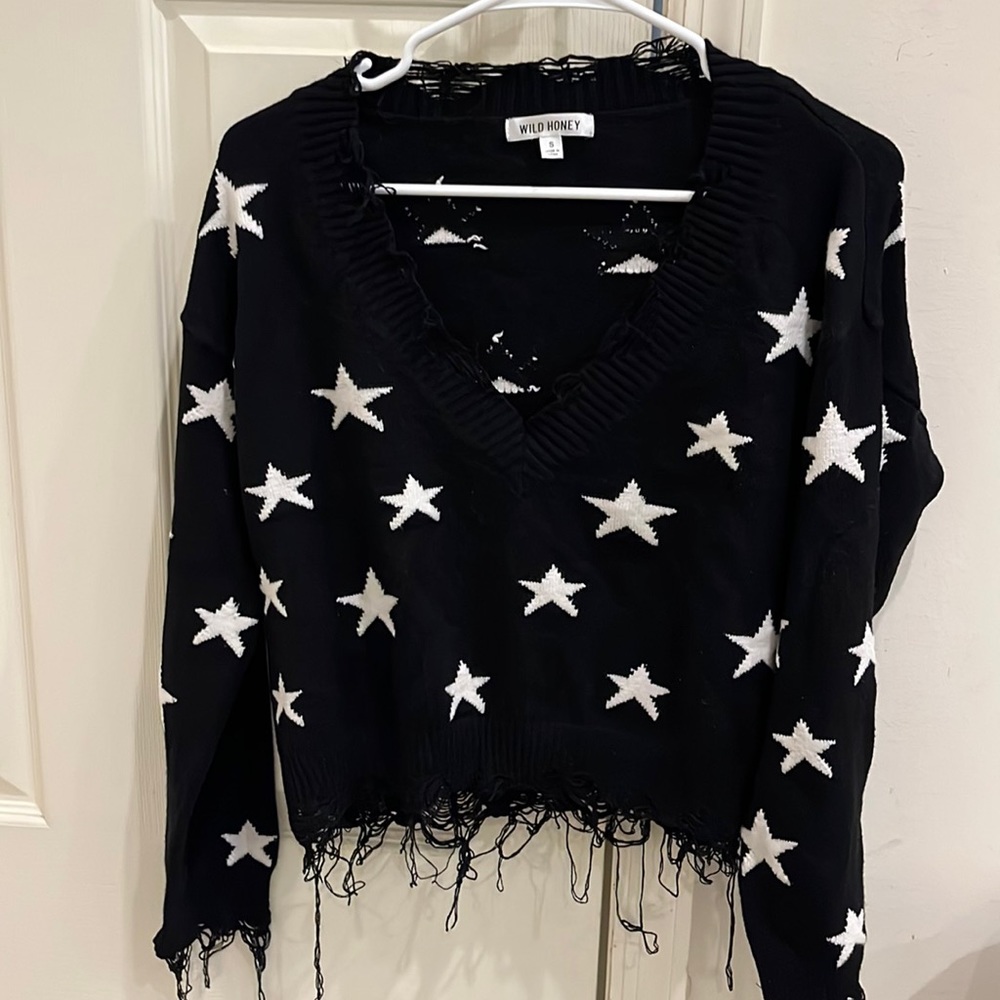 Wild honey v neck black distressed sweater with white stars. Size small